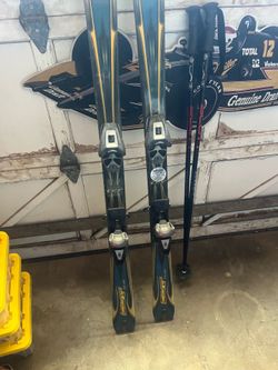 Scott Equip Ski Poles and Rossignol Cut 10.4 L Skis