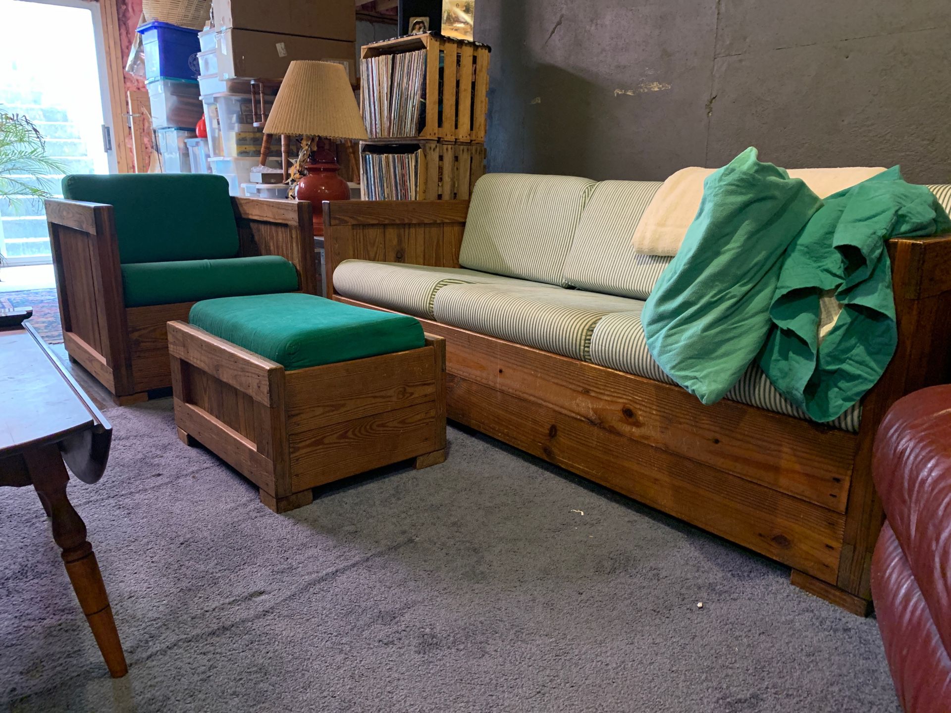 THIS END UP FURNITURE: Couch (green ticking fabric) 6 1/2 feet long ; 2 Chairs (solid green material); 2 End Tables; 1 Ottoman. $225