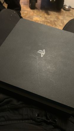 Sony PlayStation 4 slim 500GB with wireless controller