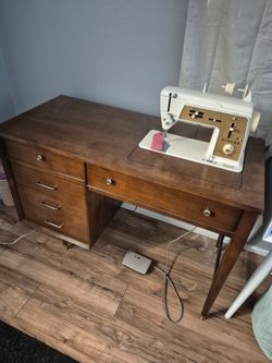 Singer sewing machine needs a little work 65.00