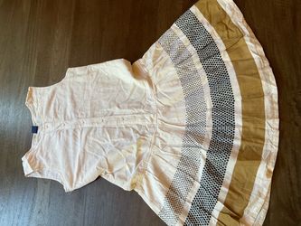 Gap Kids white and cream dress with black polka dots on a beige background, size XXL (14-16) . Please see picture for the stain.