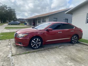 Nissan Altima Red Sedan