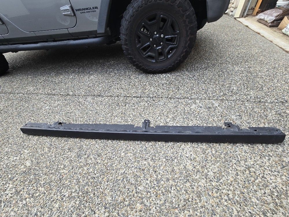 Jeep Wrangler stock foot rails. Two of them.