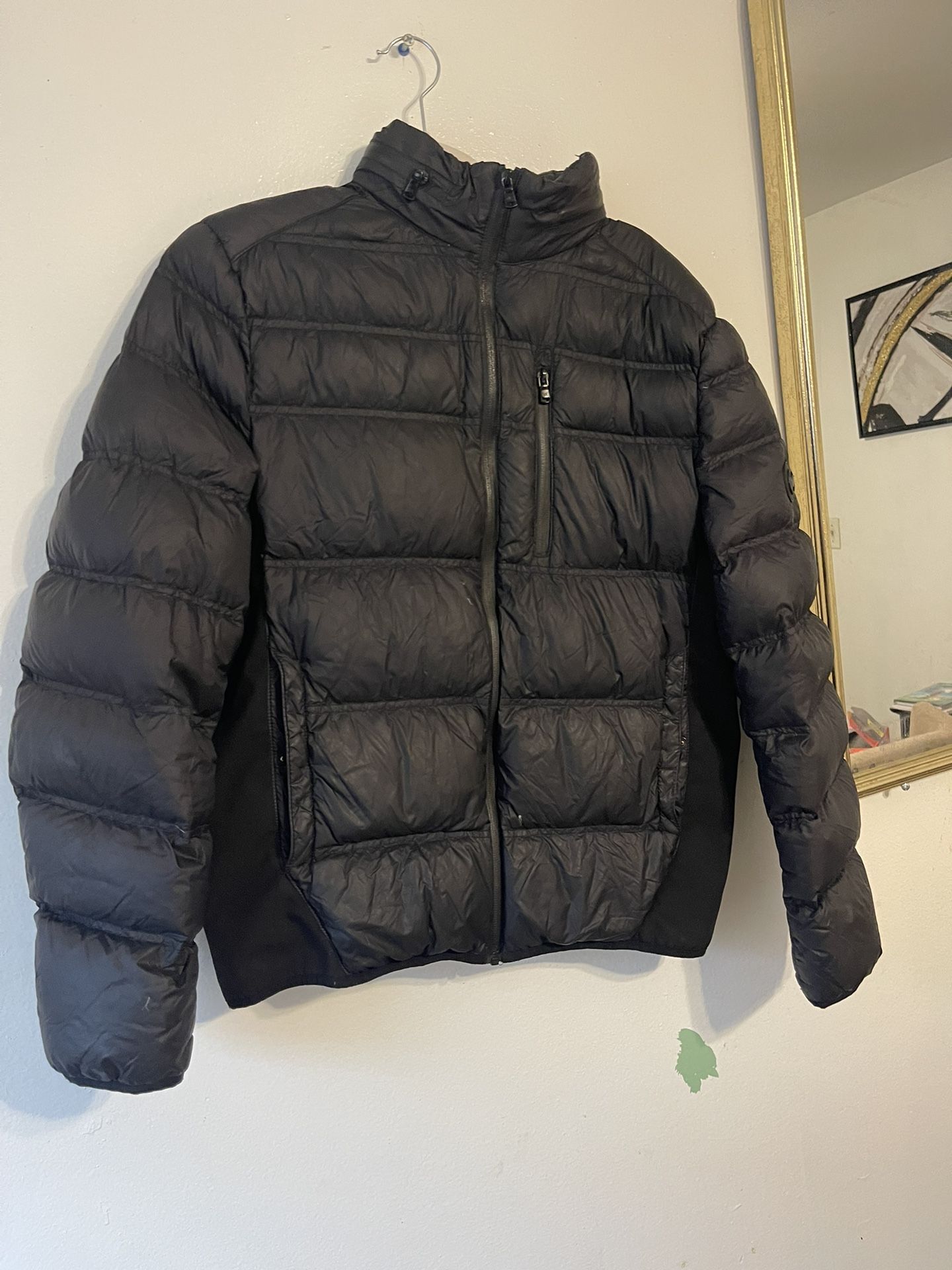 a Michael Kors Women Puff jacket