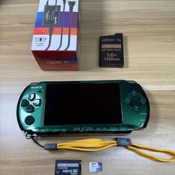 Green PSP 3000 Console with 100 games installed.        P31