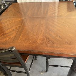 Sturdy Wooden Table w/ 8 Chairs. Counter height. 