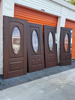 Wood/Fiberglass Entry Doors 35.5 x 79.5-in No swing with Oval Glass Insert