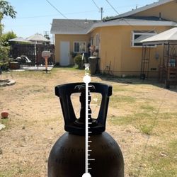 Helium gas cylinder in good condition.