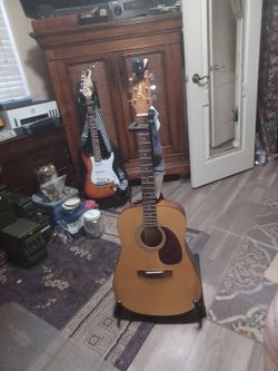 Jasmine Acustic Dreadnought guitar with Wavypoint Stand.