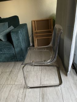 2 Clear Ikea Chairs 