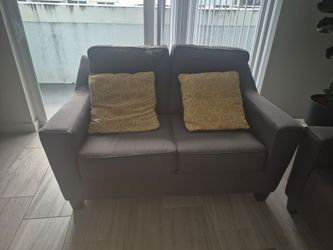 Grey sofa set in gray