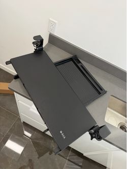 Sliding underdesk keyboard tray