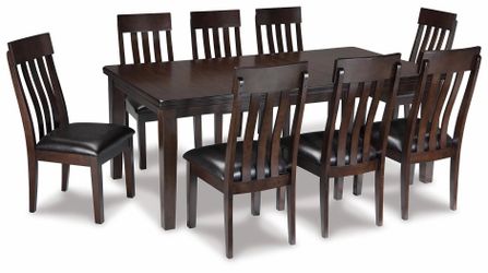 99% new Haddigan Dining Table and 8 Chairs