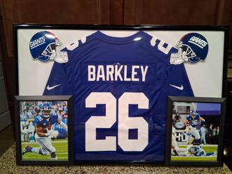 SAQUON BARKLEY OF THE NEW YORK GIANTS, BRANDED,AUTHENTIC,ON FIELD FRAMED JERSEY.