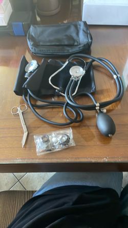 Blood pressure cuff, stethoscope, Shears & extra parts