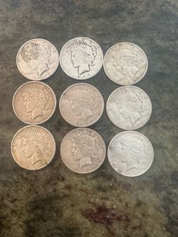 9 silver peace dollars