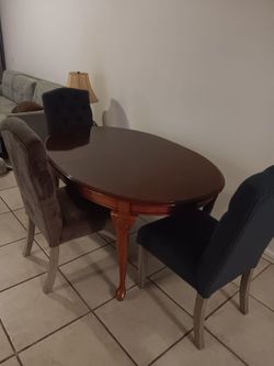 Oval Wood Dining Table with a chairs