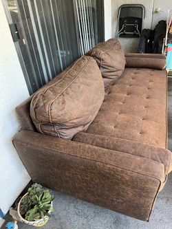 Modern brown tufted loveseat