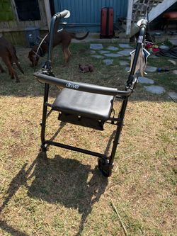 Drive four wheel walker with basket