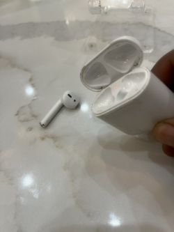 Left AirPod With AirPod Case 