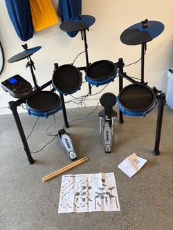 Eight-piece electronic drum kit with mesh heads