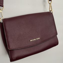 Michael Kors plum/burgundy spacious cross body bag