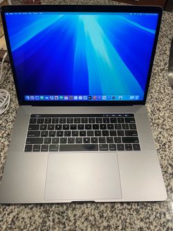 2019 Apple MacBook Pro 15-inch Retina Display Touch Bar  2.6ghz 6-core i7 processor. 16 gb RAM500gb ssd