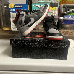 Nike Air Jordan 1 Mid ‘Black/Cement Grey/Red’