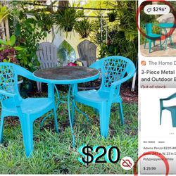 $20 Rustic Patio/Garden Set ;Metal table and 2 plastic chairs. Table need a paint job