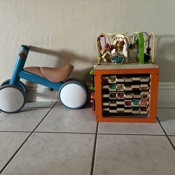 2- Child Toddler Toys. Wooden Activity Cube. Balance Bike. Good Condition.