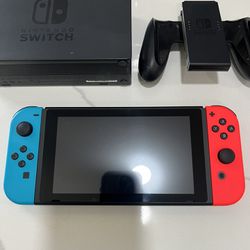 Nintendo Switch Console with Neon Blue and Red Joycon Controllers
