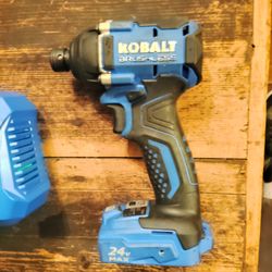 Kobalt 24v Max Brushless ¼" impact driver kit w/ 2 Ah battery , Charger and Carrying Case.