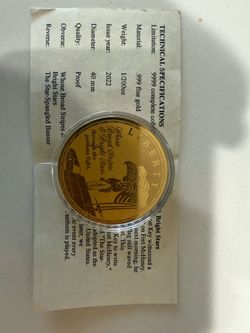 .999 Gold Commemorative coin featuring a "Star-Spangled Banner" design