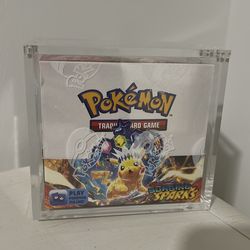 Brand new, sealed Surging Sparks Booster box!