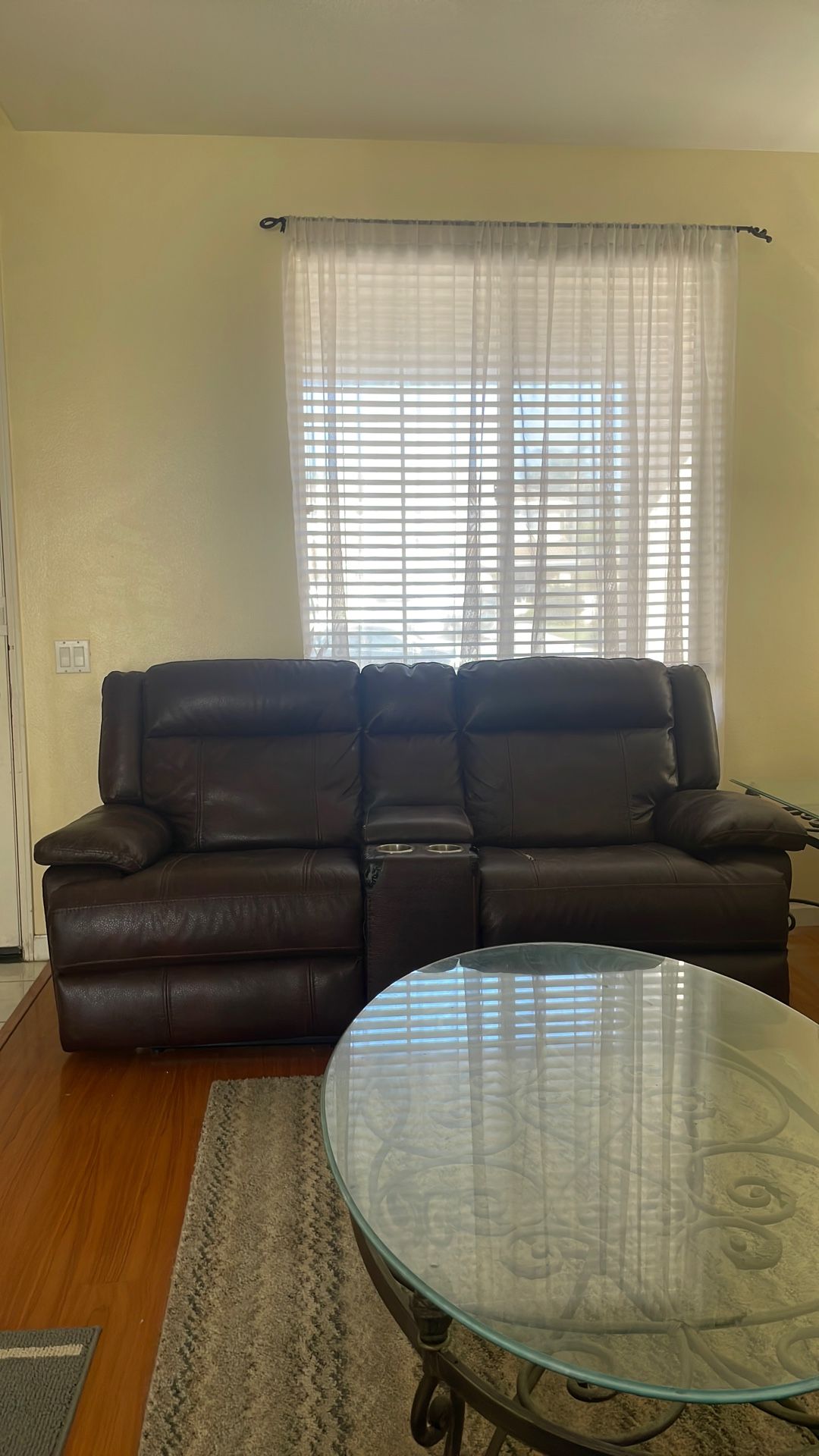 leather couch that has recliners