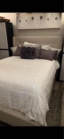 Queen Upholstered Bed Frame with Tufted Headboard. Mattress and box spring included.