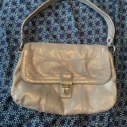 Perfect, small silver coach purse no wearing or damage