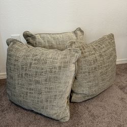 Three Large Beige Pillows