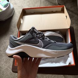 Nike Legend Essential 3 Next Nature men's training shoes in the Smoke Grey, White, and Dark Smoke Grey colorway