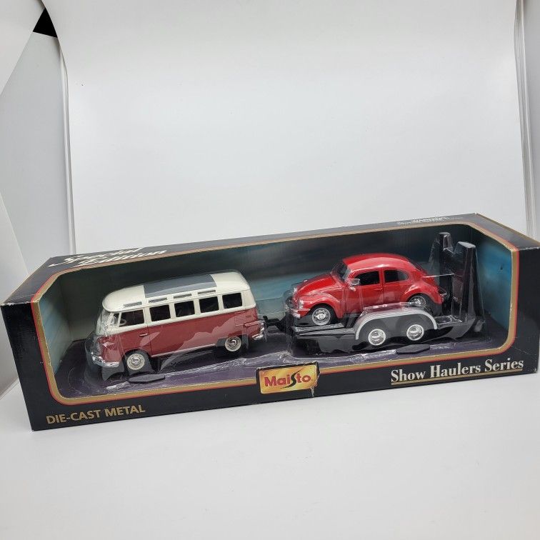 Maisto Road & Track Die Cast Red Volkswagen Van Samba with VW Beetle 
New sealed. Show Haulers series. Van 1:25, Beetle 1:24.
UPC 08. Produc