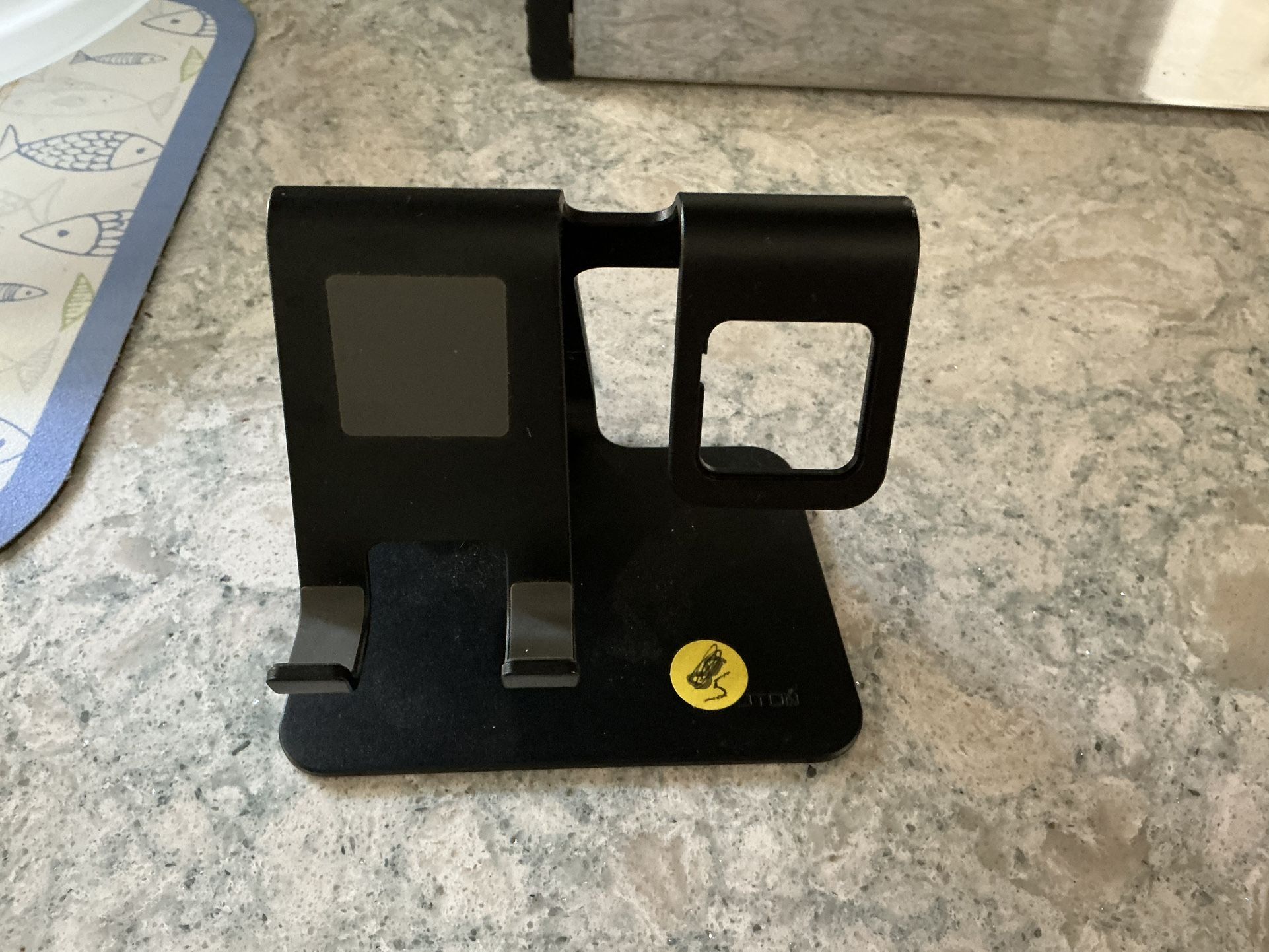 OMOTON 2-in-1 stand to hold both a phone and an Apple Watch.