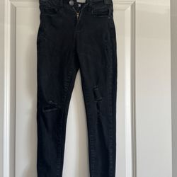 Ripped black skinny jeans 