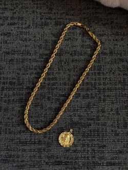 Gold plated rope chain and jesus pendant
