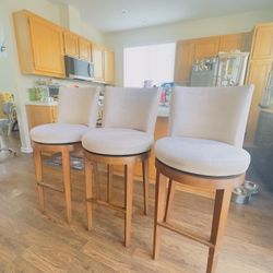 3 Suede Swivel Bar Stools 