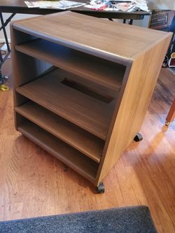 Printer stand with rollers