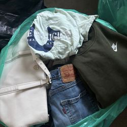 Big bag of women’s brand name clothing