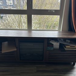 Entertainment center with heat and storage