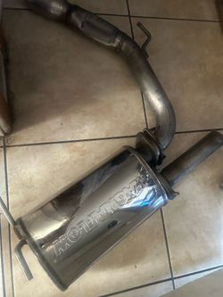 Muffler magnaflow, performance sports, es husado pero esta bueno
