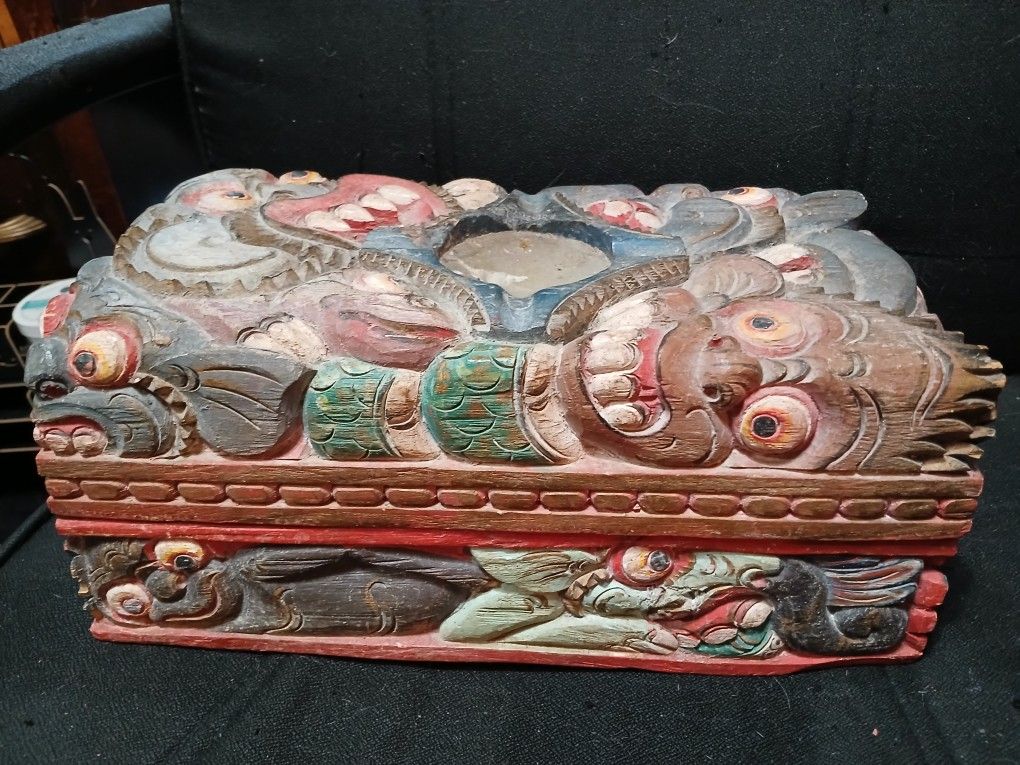 Old Wooden Monkey Box With Candle Holder On Top And Sections Inside The Box