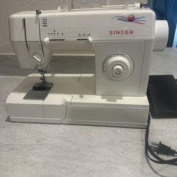 Maquina De coser singer